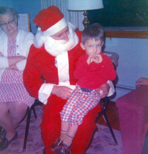 William + Santa (Uncle Paul Ryder) with Aunt Belle Murray taken at Ryder’s